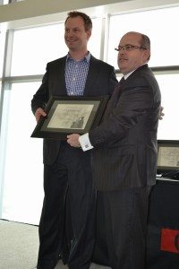Dr. Jeremy Begalke receives the Distinguished Alumni Award, from GPRC President and CEO, Don Gnatiuk