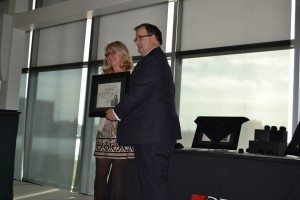 Sharron Barr receives the Distinguished Volunteer Award from GPRC VP External Relations, Carmen Haakstad