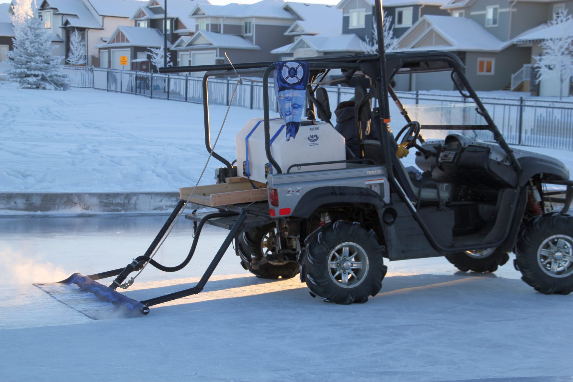 Homemade Zamboni takes Whispering Ridge rink to next level