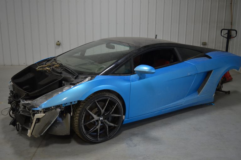 Stolen Lamborghinis found on same property as automatic weapons