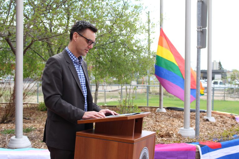 City Hall raising flag in solidarity with LGBTQ2 community