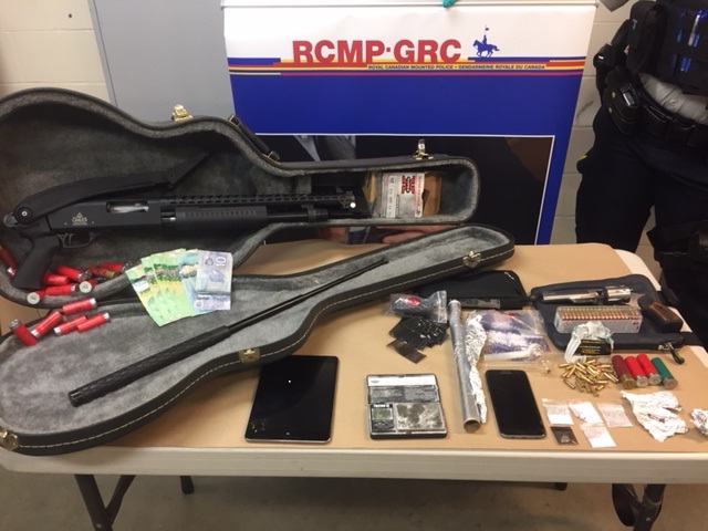 Guns, drugs seized from suspicious vehicle