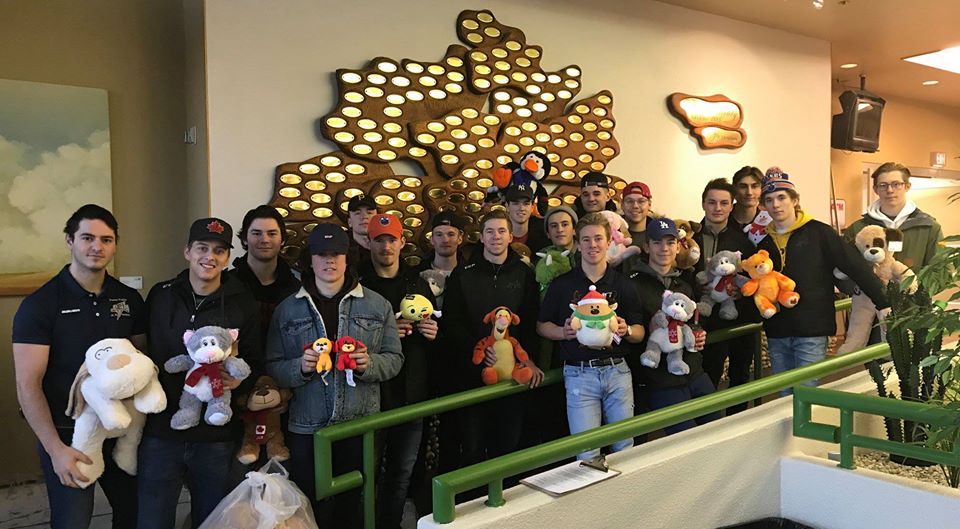 Grande Prairie Storm Players drop off bears after the 2018 Teddy Bear Toss (Grande Prairie Regional Hospital Foundation, Facebook)