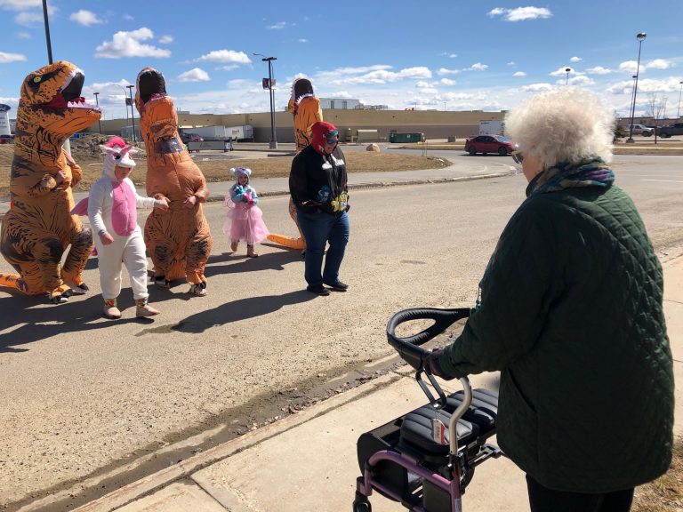 Dinosaurs on parade bring smiles to seniors