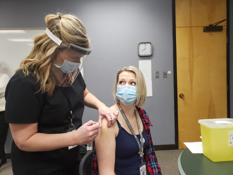 First COVID-19 vaccines administered to health professionals in Grande Prairie