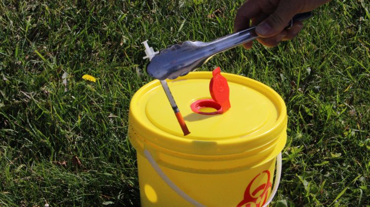 A discarded needle found during a needle sweep in September 2019. (Michael Lumsden, mygrandeprairienow.com staff)