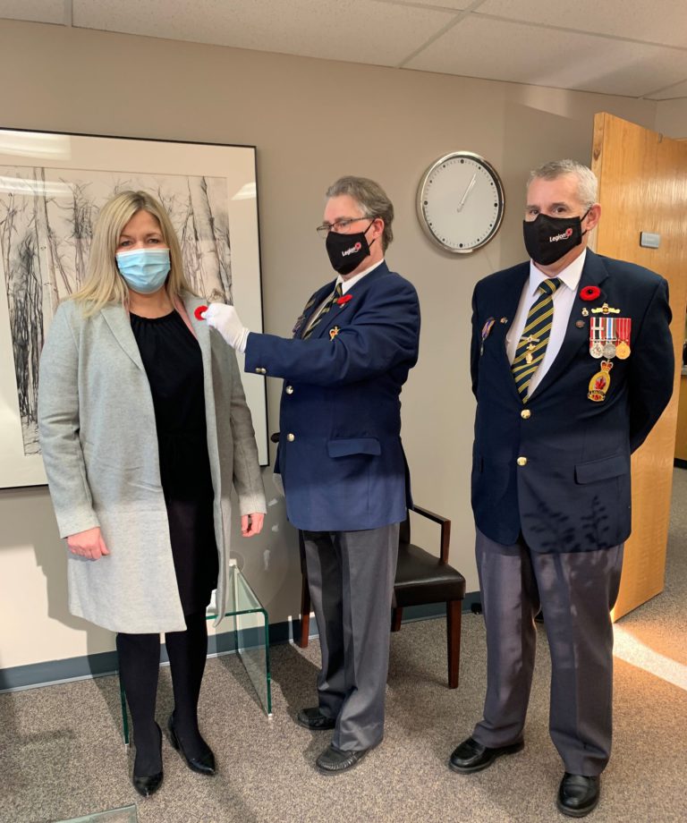 Mayor Clayton receives first poppy as Royal Canadian Legion kicks off annual campaign