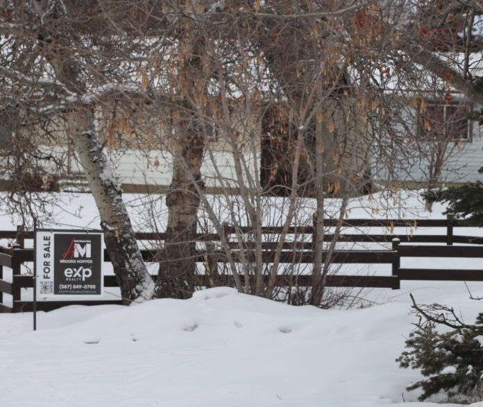 For sale sign at a home in Grande Prairie (Photo Kass Patterson MyGrandePrairieNow.com staff)