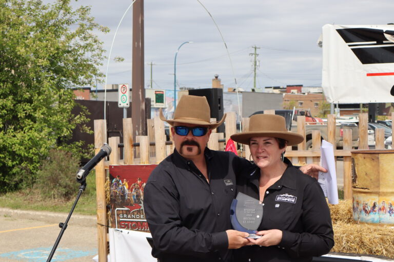 Long-time Stompede board member receives “Stomper of the Year” award during Bust Out Barbecue